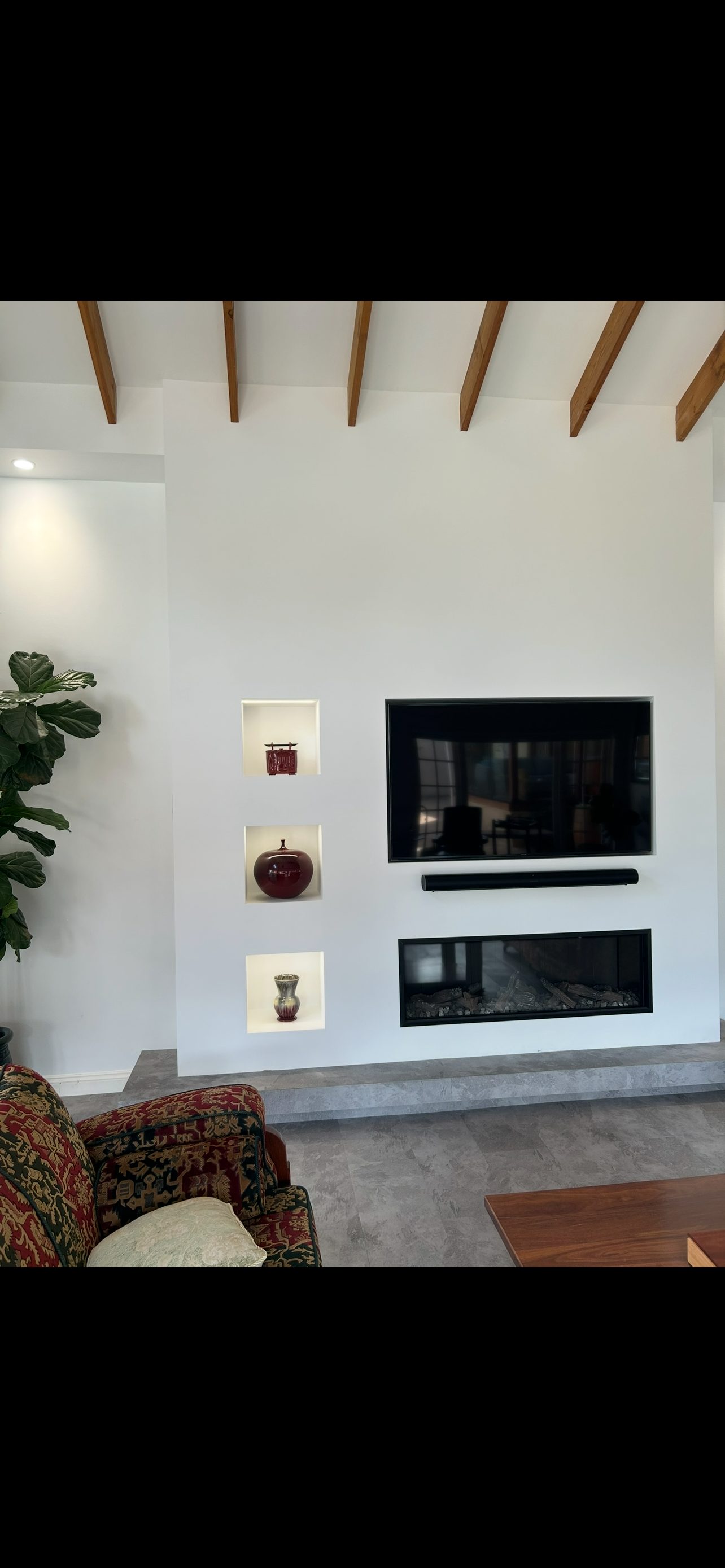 Feature lighting niches and AV wall integration
